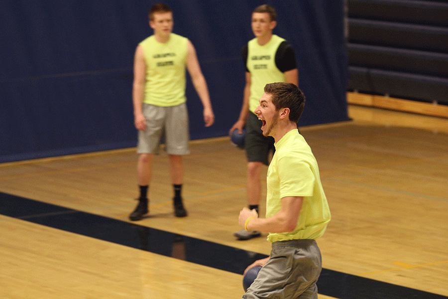 Junior Clayton Holmberg cheers after hitting an opponent.