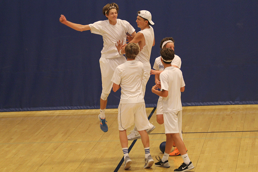 The Dodgefathers team celebrates after winning the dodgeball tournament.