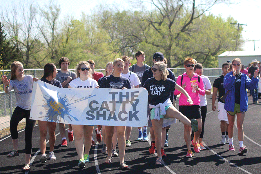 Members of the Catty Shack walk in the opening parade of the ACCESS House Spring Fling on Thursday, April 30.