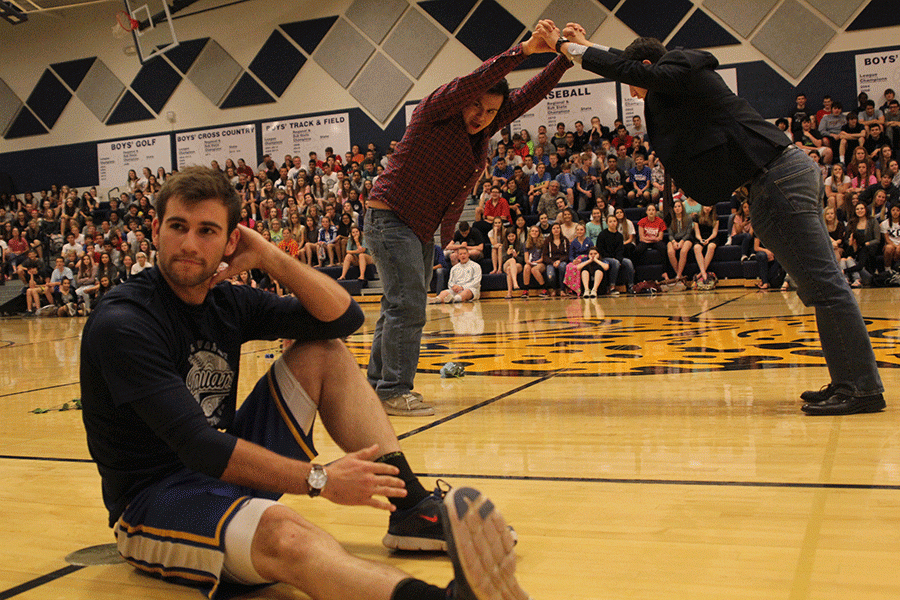 Senior Eli Stewart, Austin Moores and Adam Segura lip sync to the song Sweet Caroline by Neil Diamond. 