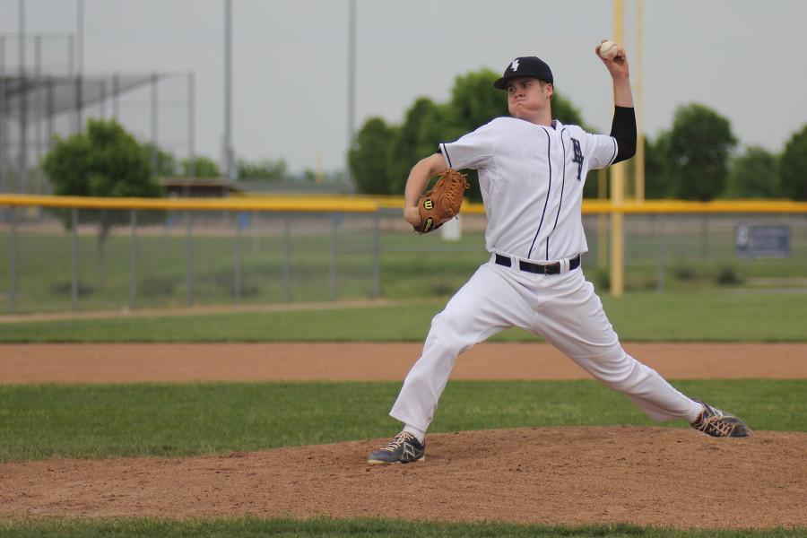 Focused on the catcher, junior pitcher Tyler Grauer pitches against Bishop Ward on Tuesday, May 5. 