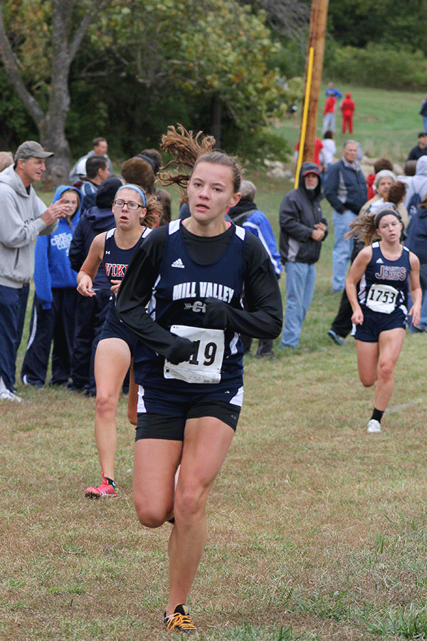 Running at the State 5A Cross Country Championships, senior Hollis Tharp sprints to the finish on Saturday, Nov. 2 at Rim Rock Farm. “I love cross country and track because it has become a part of who I am as a person,” Tharp said. “It has showed me how strong I can be and it has helped me through tough situations.” 