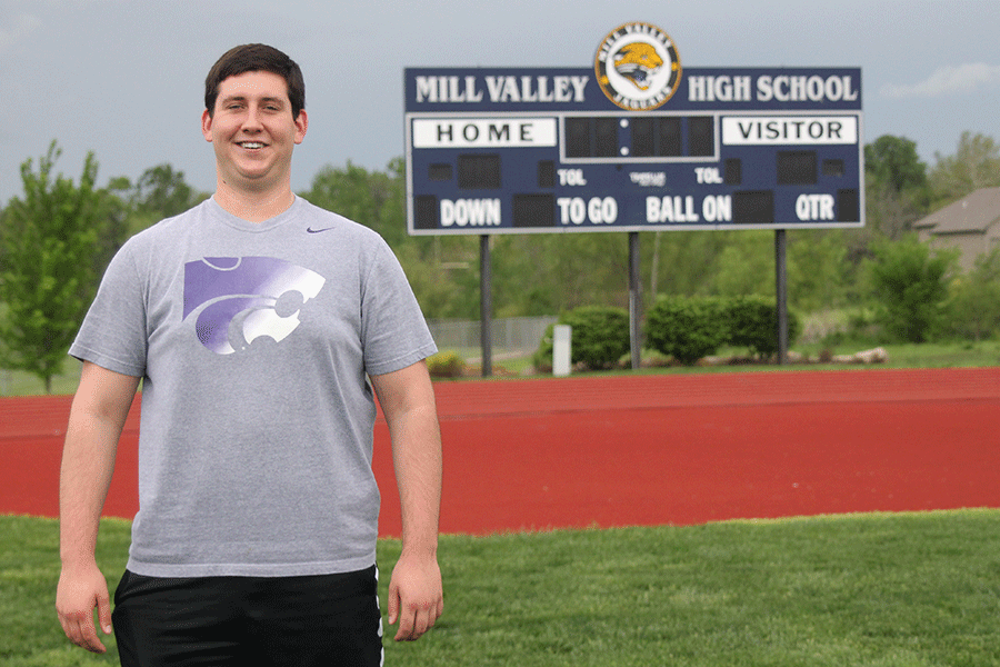 Senior Evan Applegate stands on the football field on Wednesday, May 6. Applegate has signed to Kansas State University to play football.