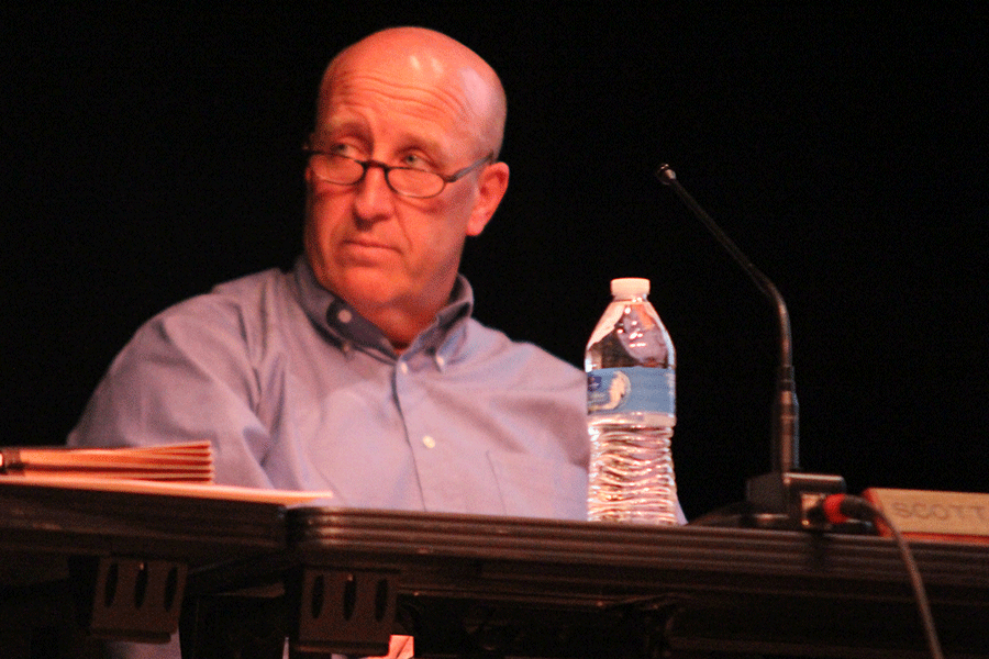 Board of Education member Scott Hancock listens during a Board meeting on Monday, March 9. On Tuesday, Aug. 18, registered voters in the district will decide whether to recall Hancock from office for allegations of harassment and sexual harassment.