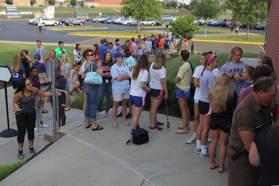 Seniors wait in line to select their parking spot for the year.