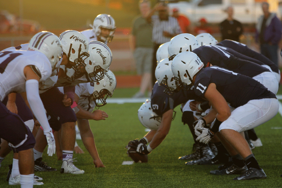 Senior Cole Morris, prepares to hike the ball to senior kicker Andrew HIcks.