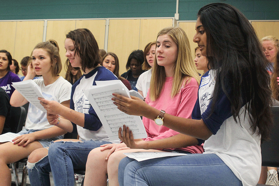 Student choreographers, Alison Booth and Caroline Gambill rehearse their songs for the musical.