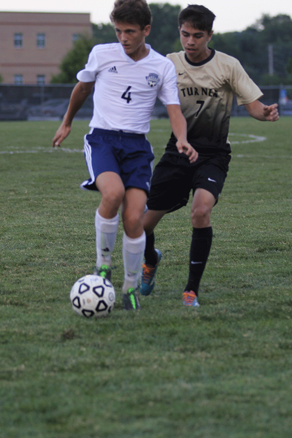 Junior Adam Grube looks for an option as he receives the ball. 