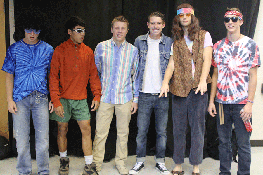 Back to the Future day winner, senior Cooper Hutteger poses with his friends on Wednesday, Sept. 16. He won two tickets to the Homecoming dance. 