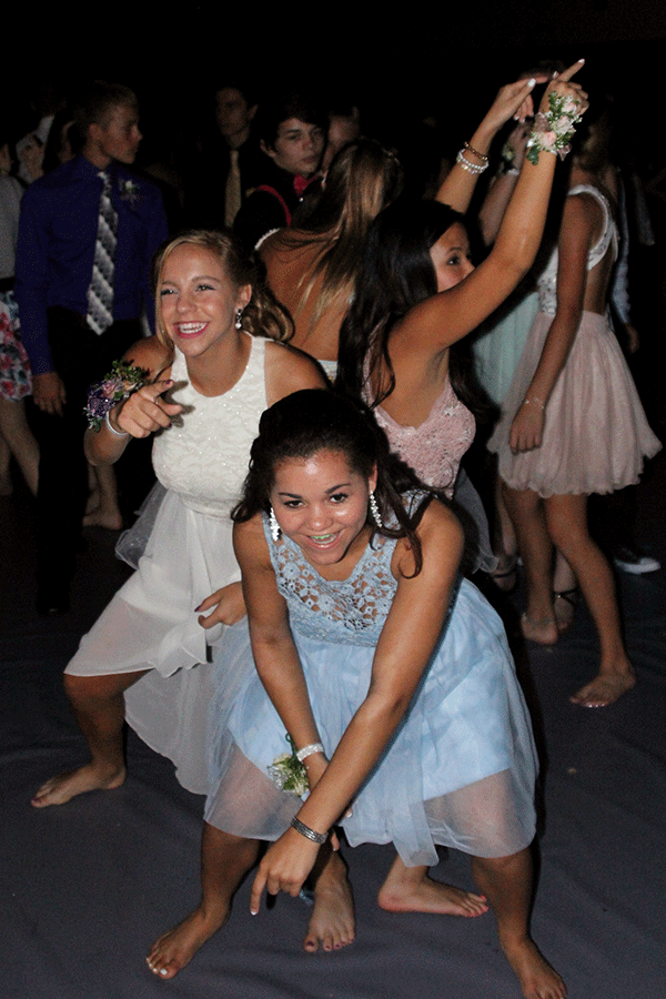 Freshman Presley Barton dances with her friends on Saturday, Sept. 19.