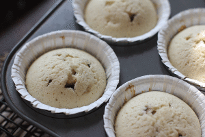 Flecks of vanilla been seed can be seen in the vanilla cake layer after baking.