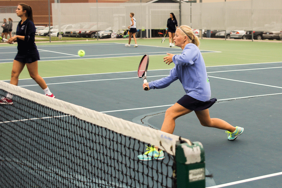 Paige Wiebe warms up for her tennis match. 