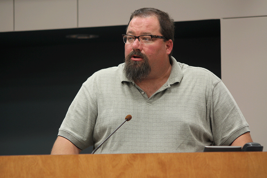 Board candidate Kevin Bogart answers questions posed to him by the Board. 