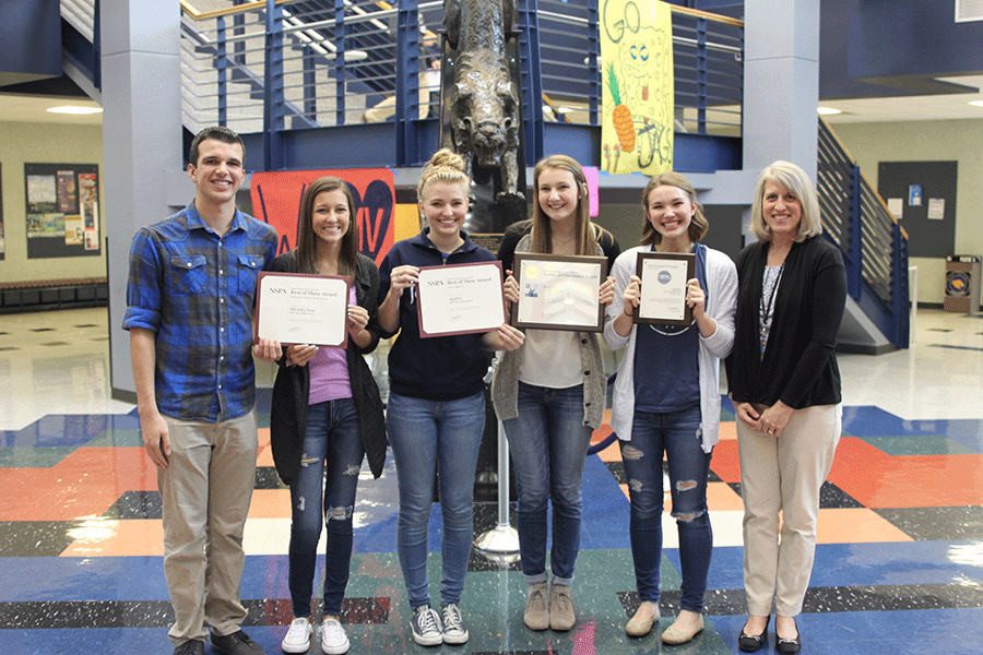 JagWire+editors-in-chief+Tori+Aerni%2C+Sarah+Myers+and+Karissa+Schmidt%2C+Mill+Valley+News+editor-in-chiefs+Justin+Curto+and+Jena+Smith+and+adviser+Kathy+Habiger+hold+up+the+awards+earned+by+the+journalism+department+on+Wednesday%2C+Nov.+18.
