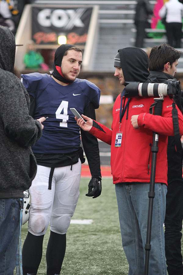 Senior Logan Koch is interviewed after the conclusion of the game. 