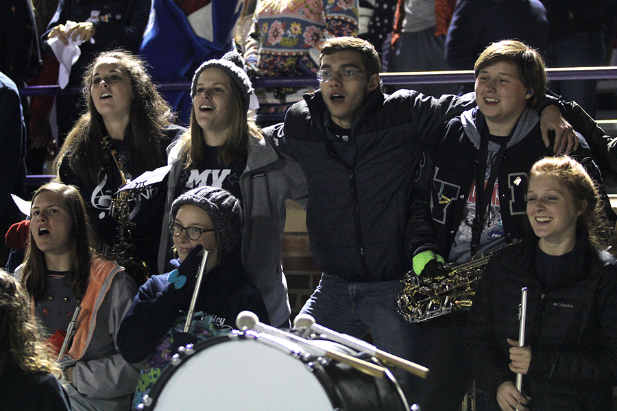 Towards the end of the game, part of the band joins together to sing.