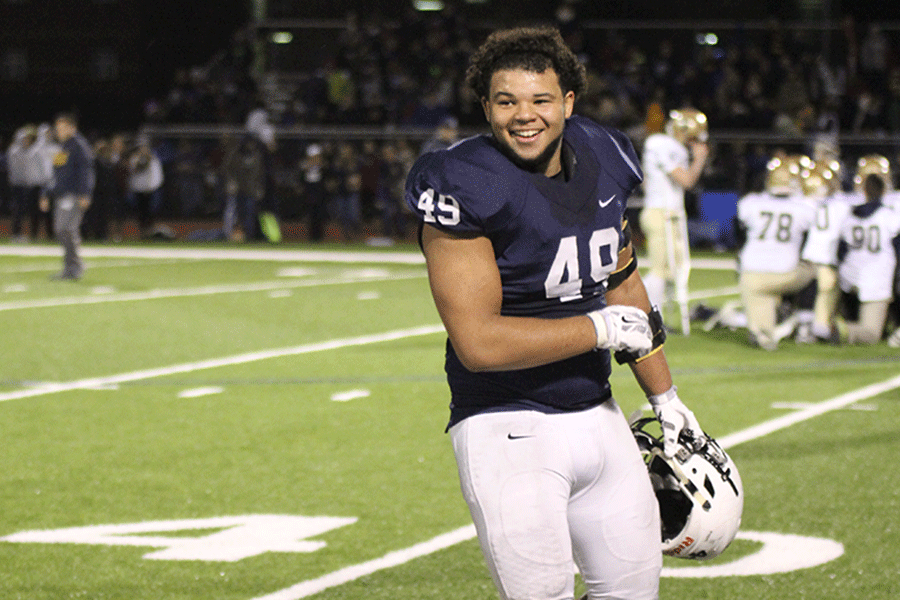 Senior Anthony Brown celebrates after the game. 