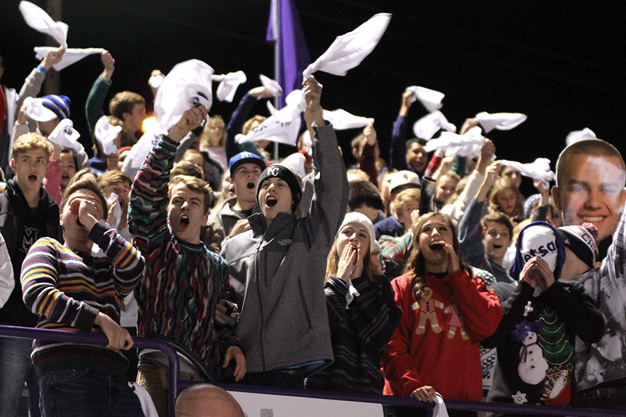 Students cheer for the team at the start of the game against Pittsburg.