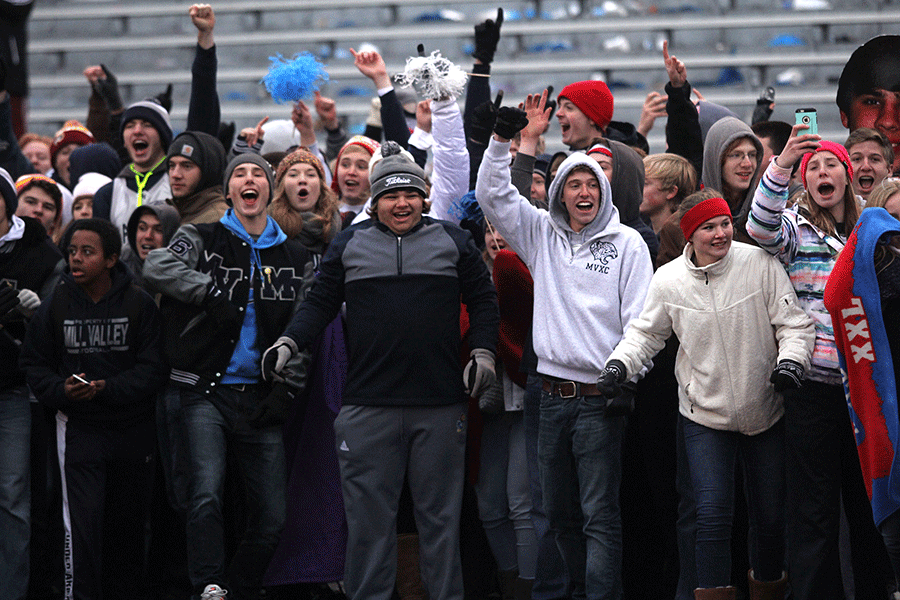 Fans prepare to storm the field after the Jaguars beat Bishop Carroll 35-14.