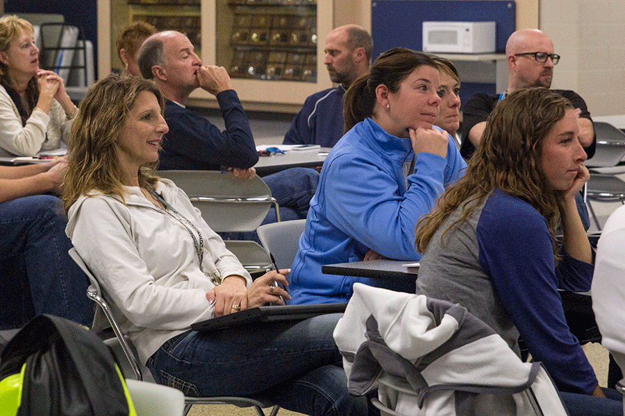 Along with the rest of the teaching departments, math teachers Laurie Deuschle and Kristen Chavez review the new state assessments and scoring standards on Friday, Oct. 30.