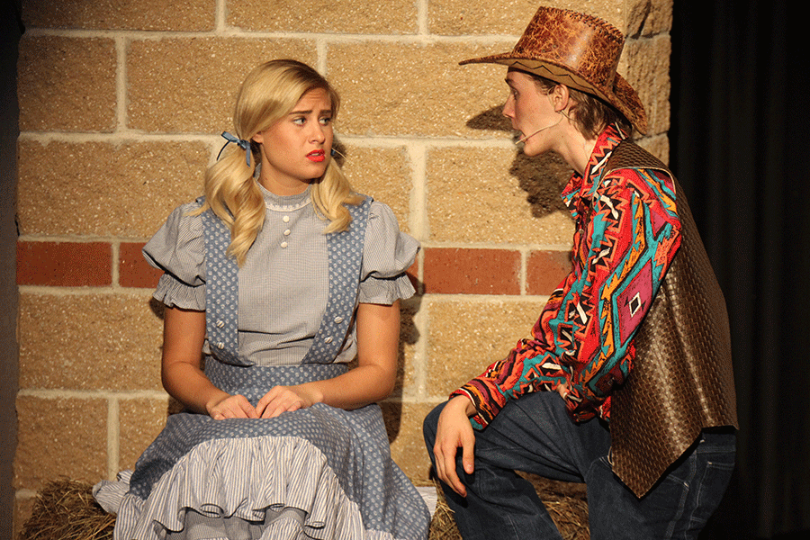 In the middle of I Cant Say No, senior Aidan Quinn sings to senior Siera Thompson in Oklahoma!