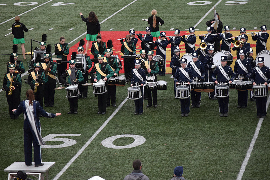 The Mill Valley band and the Bishop Carroll band performed Planet Queen together during the halftime show. 