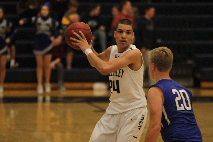 Senior Derrell McLemore searches for an open teammate. 