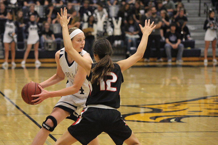 Sophomore Evan Zars plays defense against Bishop Ward.