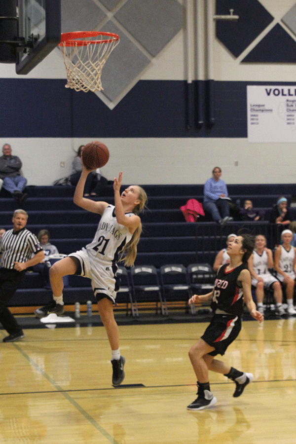 Freshman Lexi Ballard attempts a layup.