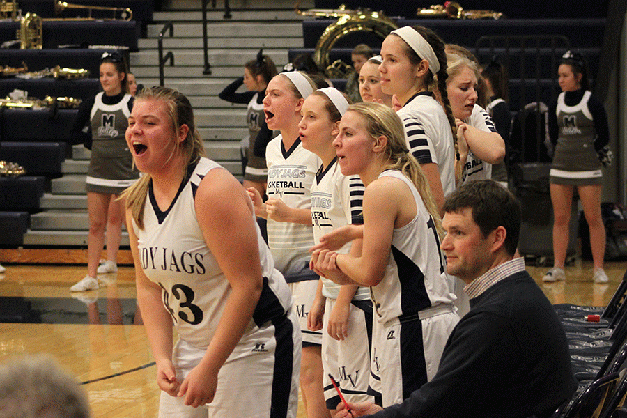 Junior Ashlynn Hendrix cheers after the Lady Jags gain possession of the ball. The Lady Jags defeated Shawnee Mission South 56-43 on Friday, Jan. 22.