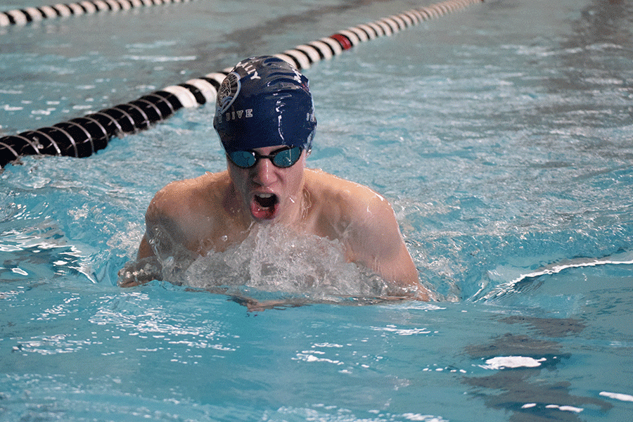Freshman+Chris+Sprenger+swims+in+the+200+yard+IM.+Sprenger+placed+second+overall+in+the+event.+