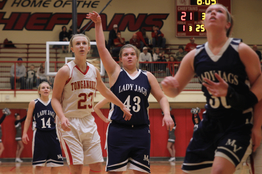 Stepping back after a free throw, junior Ashlyn Hendrix watches the ball go through the hoop.