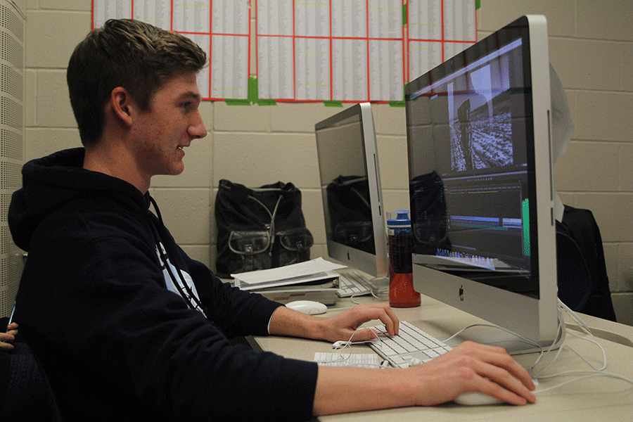 While in seminar, junior Nick Nelson reviews a video on Monday, Jan. 25.