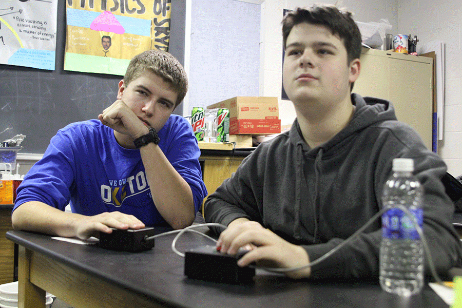 With their hands on the buzzers, seniors Jacob Hubert and Jack Booth compete at the Quiz Bowl tournament at Maranatha Christian Academy on Thursday, Jan. 21.