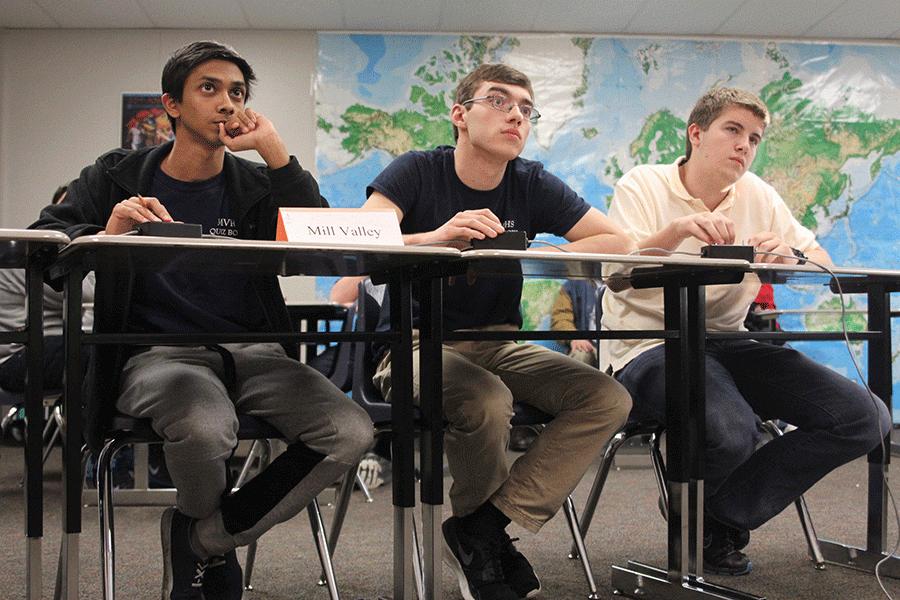 At the league KVL meet on Wednesday, Feb. 3, seniors Rohit Biswas and Jacob Hubert and junior Tom McClain, listen intently as the speaker asks the next question