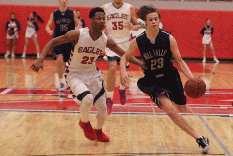 Boys basketball defeated by Olathe North