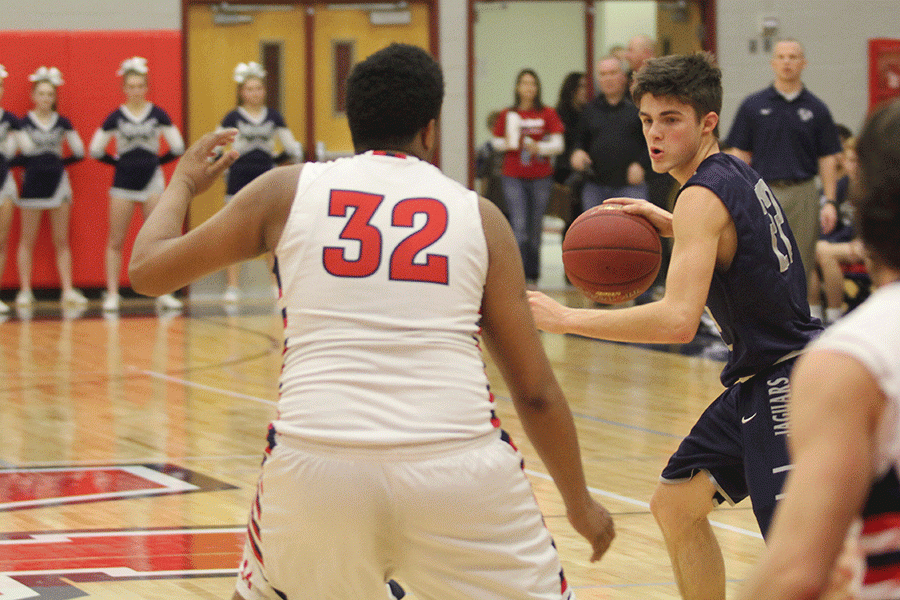 Senior Casey Conklin prepares to pass the ball.