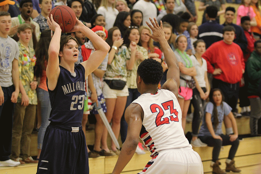 Sophomore Cooper Kaifes prepares to shoot over a block.