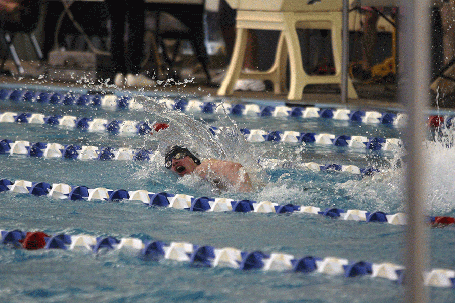 Senior Brennan Teasley swims freestyle at the 5A-1A Swim and Dive State competition.
