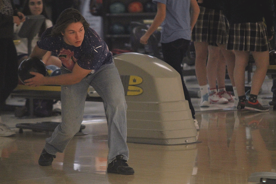 Eyes set on the lane, senior Tyler Shurley prepares to throw a bowling ball to practice for regionals at Park Lanes on Wednesday, Feb. 24. The boys bowling team placed first at the regional bowling meet in Emporia the following day.
