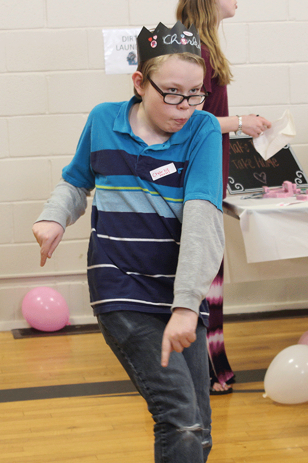 Freshman Charlie Brock shows off his dances moves.