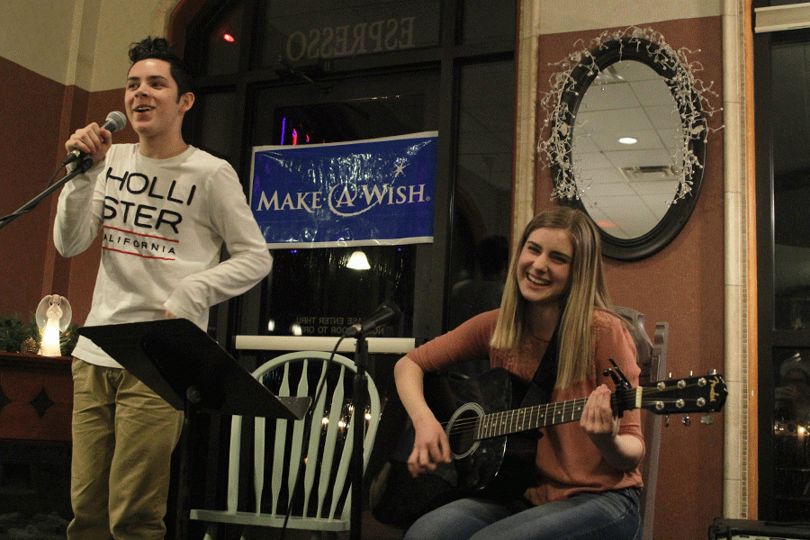 Sophomores Dominic Martinez  and  Caroline  Gambill perform two songs at the open mic night on Monday, Feb. 1. 