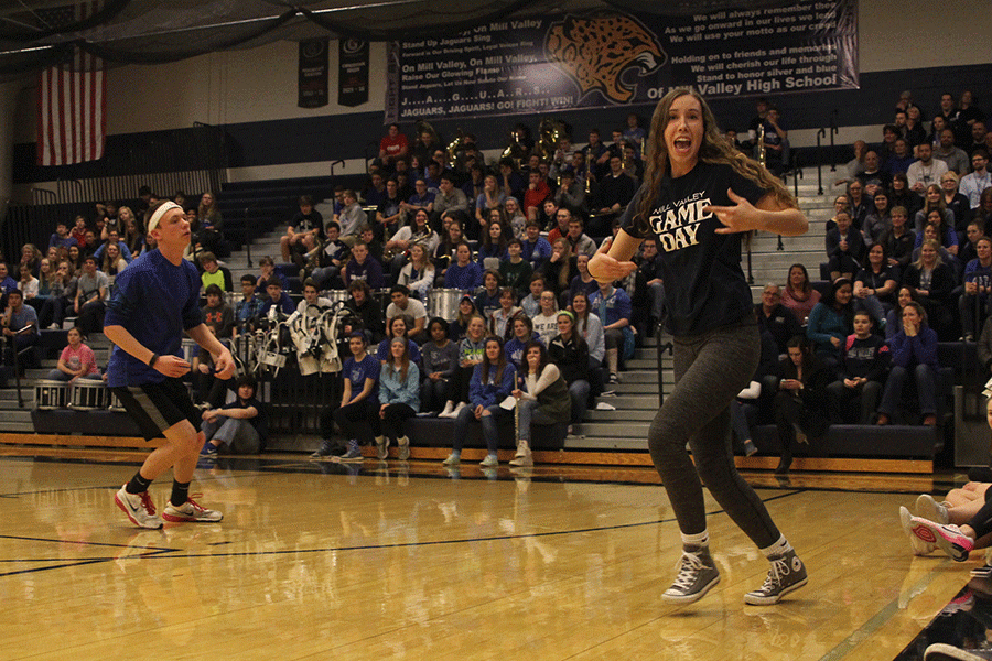 Seniors Jeremiah Kemper, Merrick Vinkie and Dalton Sieperda (not shown) compete on behalf of the senior class in a dance-off during the Winter Homecoming pep assembly.