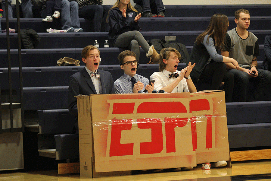 Senior Brian FitzSimmons and juniors Braden Shaw and Spencer Butterfield cheer after senior Tyler Grauer ties the game.