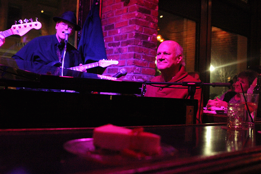 Playing on the other side of the bar, Tim Whitmer & KC Express performs at the Phoenix on Saturday, Jan. 23.