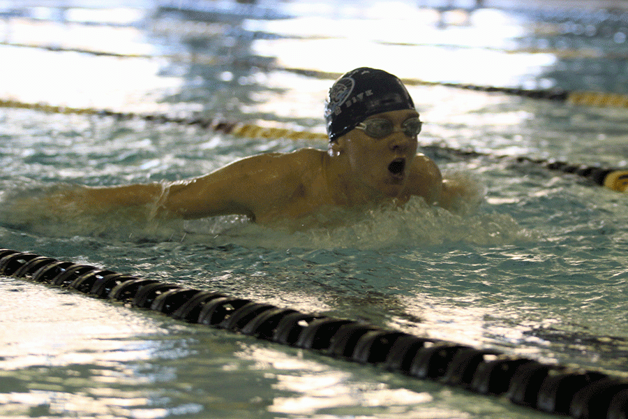 During the KVL meet at Turner High School on Tuesday, Feb. 9, senior Dan Thomas comes out of the water for a breath in the middle of the 200 yard freestyle. The team finished third overall. 