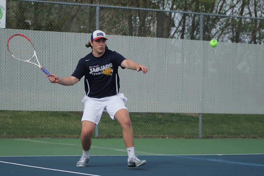 In his and sophomore Dante Petersons last match of the tournament, senior Tyler Shurley prepares to follow through with a hit.