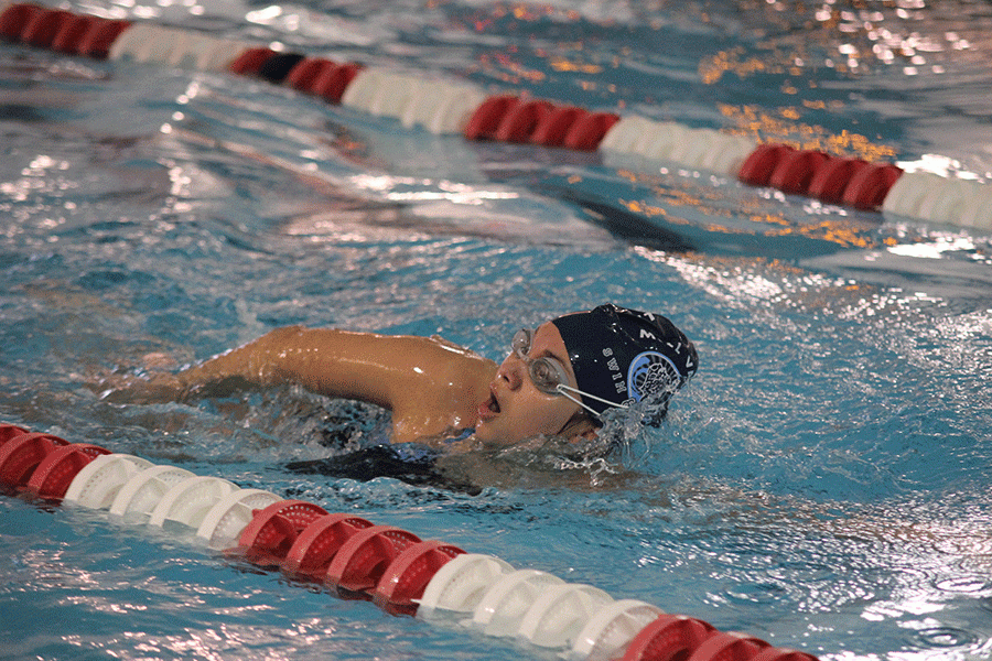 Senior Marisa Macias swims the 100 yard freestyle for the first time.