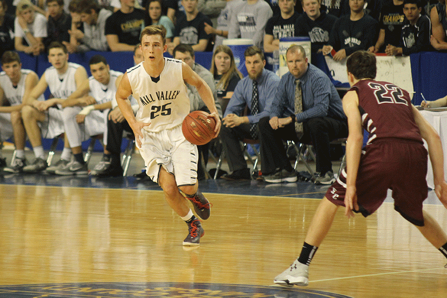 Senior Jaison Widmer comes down the court.