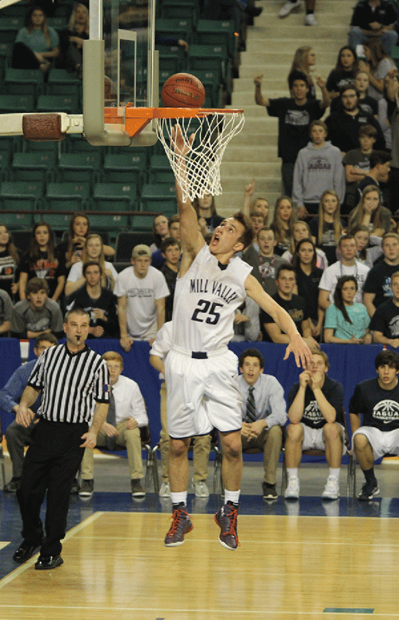 Senior Jaison Widmer makes a layup.